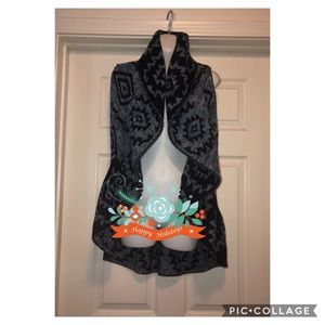 Ladies Sleeveless Poncho Sweater